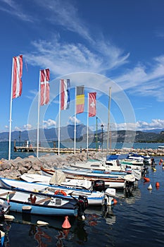 Small boats in Cisano harbor, Lake Garda, Italy