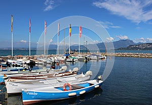 Small boats in Cisano harbor, Lake Garda, Italy