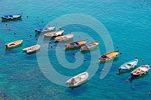 Small boats moored in calm lagoon