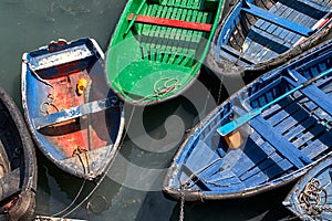 Small boats moored in the port photo