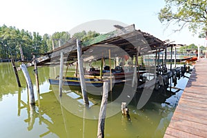 The small boats parked at pier