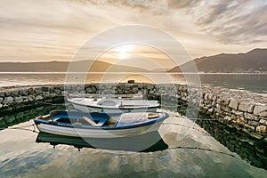 Small boats tied in little marina of Tivat harbor