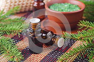 Small bottle with essential black spruce oil. Aromatherapy, homemade spa, beauty treatment, herbal medicine ingredients