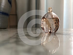 Small bottle of perfume spherical shape 02