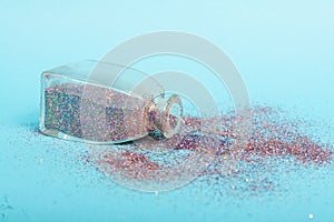 Small bottler with glitter on a green background