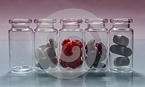 Small bottles of diferent pills