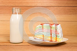 Small bottles of milk and cake.