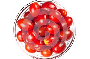 A small bowl of cherry tomatos, top view