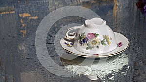 Coffee cup on wet floor