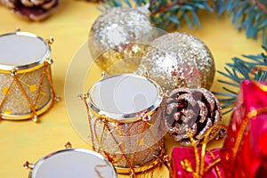 Small boxes in a pile on the table, drums and cones - close-up decor