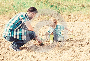 Small boy child help father in farming. new life. soils and fertilizers. happy earth day. Supporter of environment