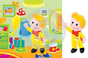 Small boy dressing to walk