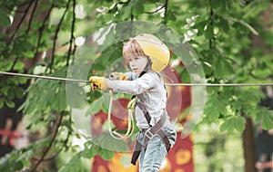 Small boy enjoy childhood years. Helmet and safety equipment.