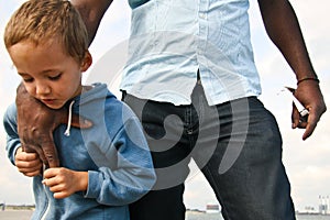 Small boy feeling safe photo