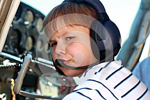 Small boy pilot in private aircraft