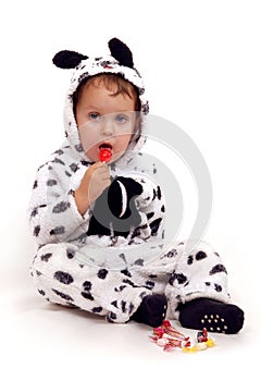 Small boy with red lolipop photo