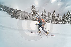 Small boy during ski mountaineering practice