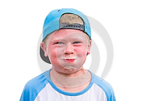 Small boy try to hold breath getting red photo