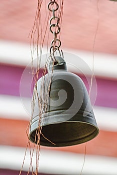 Small brass bells are commonly hung in Thai temples