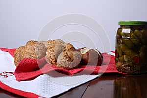 Small bread over a red and white cloths
