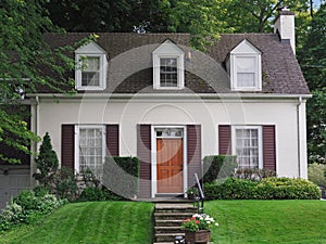 Small house with dormer windows photo