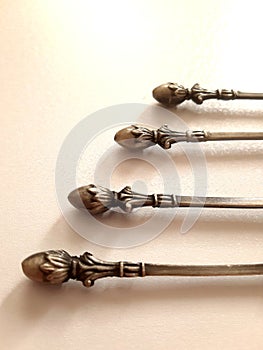 Small bronze spoons