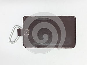 Small brown leather pouch on white isolation background