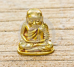 Small buddha image used as amulets on wood