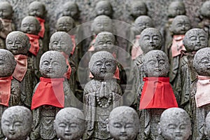 small buddha statues called Bodhisattva, in a temple in japan