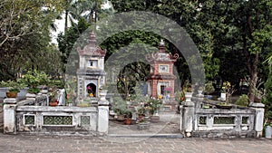 Small Buddhist shrines near the One Pillar Pagoda, Hanoi, Vietnam
