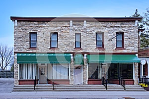 Small building with stores on ground floor