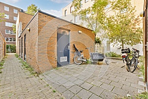 a small building with two bikes parked outside of it