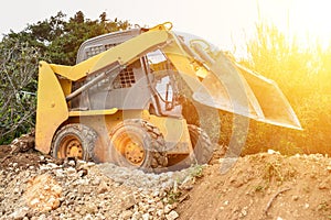 Small bulldozer. Sunny