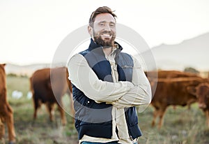 Small business, farming and portrait of man with cows in field, happy farm life in countryside in dairy and beef