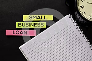 Small Business Loan text on top view office desk table of Business workplace and business objects