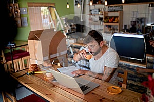 Small business owner in coffee shop photo