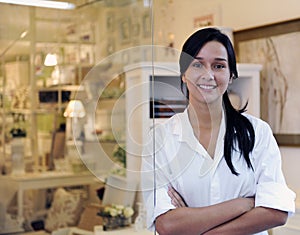 Small business owner: proud woman and her store photo