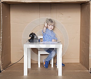 Small businessman happy with his job in the office