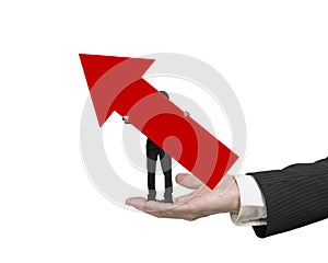 Small businessman holding arrow up on big male hand