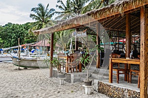 Small cafe at tropical beach in Bali