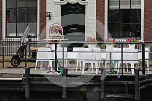 Small cafe on the waterfront near Spaarne river in Haarlem