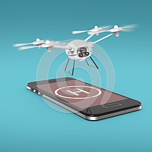 Small camera drone hovering above the touchscreen of mobile smartphone with helipad sign on screen. Concept for remote