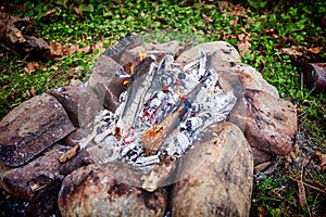 Small campire surrounded by stones