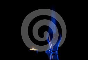 Small candle and tungsten light bulb - Wrong usage concept