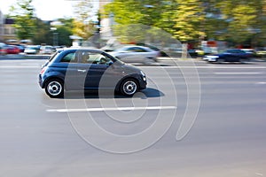 Small car running on the street