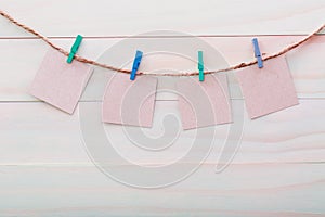 Small cards hanging with clothespins