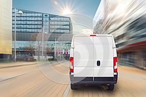 Small cargo delivery van driving in european city central district. Medium lorry minivan courier vehicle deliver package at