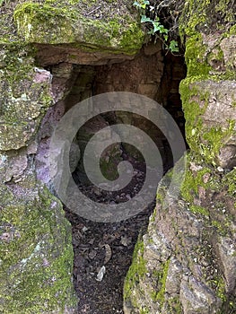 Small cave hidden in the forest below Eberstein Castle in Ebersteinburg Baden-Baden