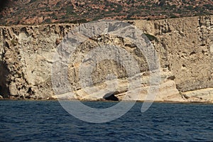 Small cave on Milos shoreline