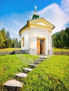 Small chapel with beautiful countryside in Pinzgau, Salzburger Land, Austria photo